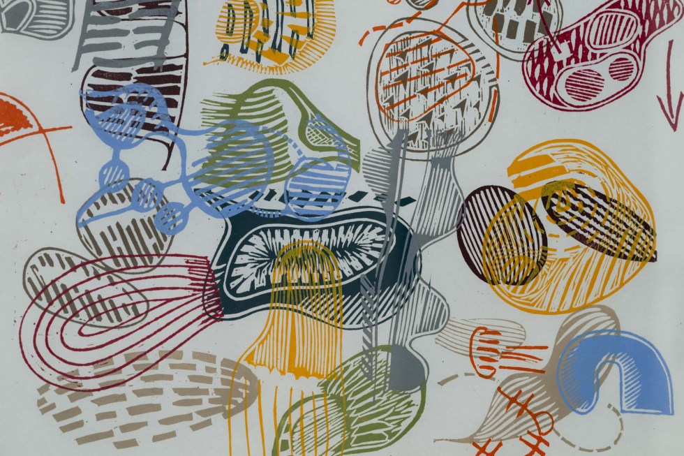 a colourful print featuring oerlapping lozenge shapes